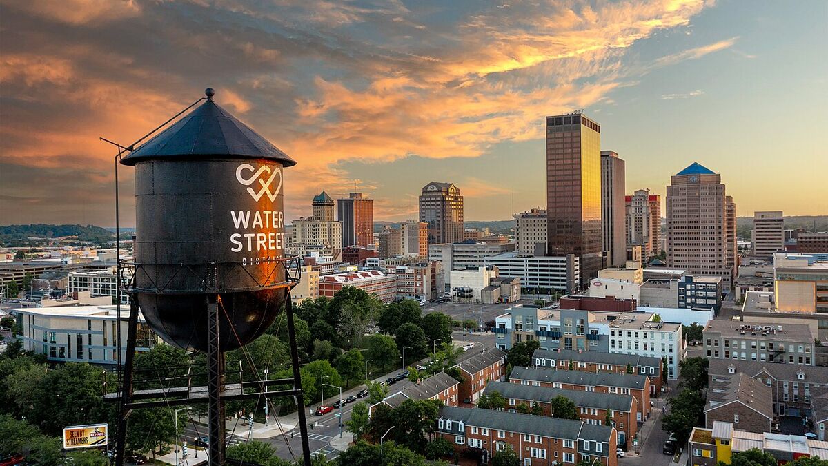 Dayton, Ohio skyline at sunset with a Water Street water tower in the foreground